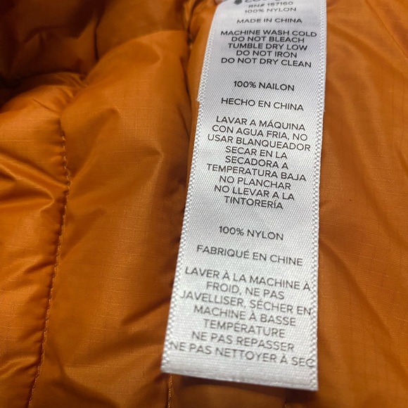 cotopaxi Teal Packable Down Vest with Blue and Orange Stripes - Picture 4 of 5